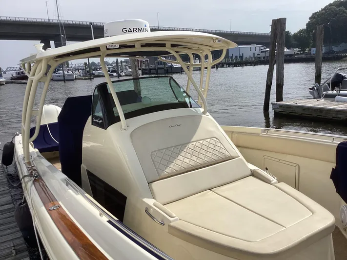  Yacht Photos Pics 2016 Chris-Craft 34 Catalina boat docked, featuring Garmin equipment and spacious seating.