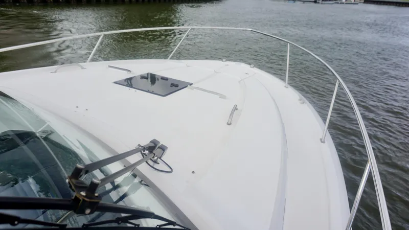  Yacht Photos Pics 2018 Pursuit OS 355 Offshore boat deck on calm water.