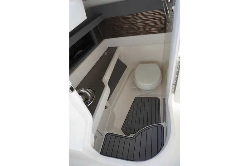 Yacht Photos Pics 2020 Sea Ray SLX 310 Outboard boat bathroom interior with toilet and sink.
