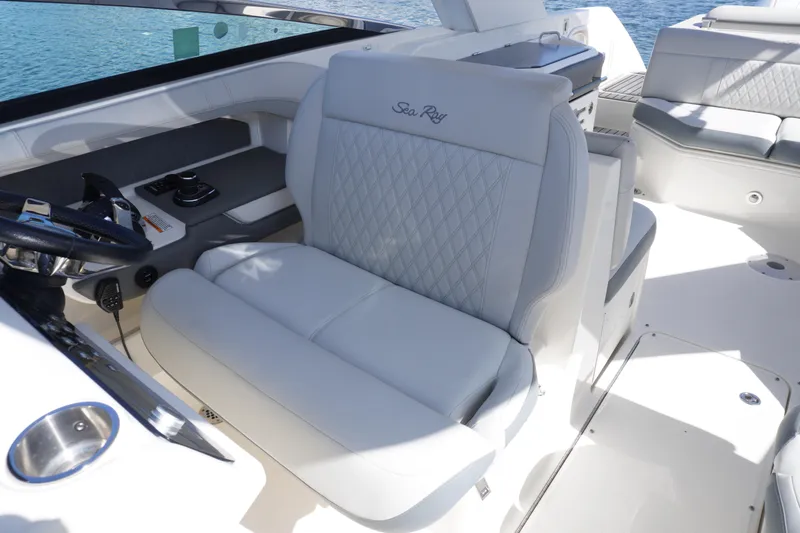  Yacht Photos Pics Luxurious interior of 2020 Sea Ray SLX 310 Outboard boat with plush seating.