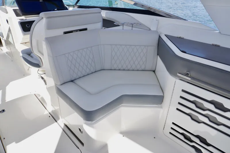  Yacht Photos Pics 2020 Sea Ray SLX 310 Outboard interior with luxurious seating and modern design.