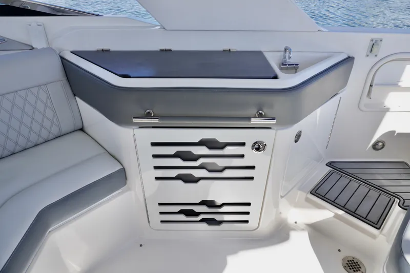  Yacht Photos Pics 2020 Sea Ray SLX 310 Outboard interior with sleek seating and modern cabinetry.
