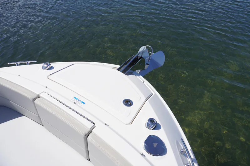  Yacht Photos Pics Bow of 2020 Sea Ray SLX 310 Outboard on clear water.