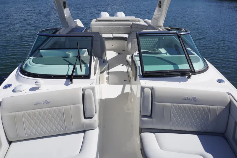  Yacht Photos Pics 2020 Sea Ray SLX 310 Outboard boat interior with luxurious seating and windshield.