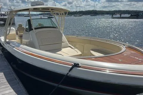 Yacht Photos Pics 2016 Chris-Craft 34 Catalina boat docked by the water on a sunny day.