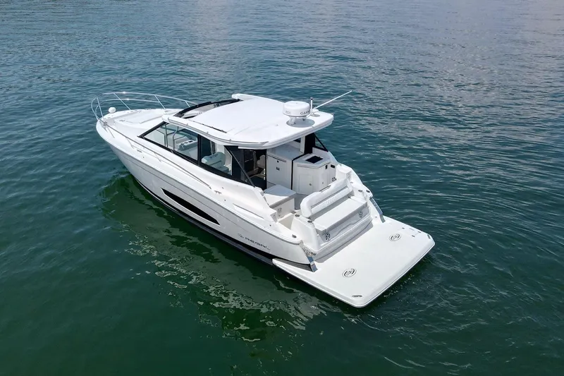  Yacht Photos Pics 2021 Regal 36 Grande Coupe boat on calm water, aerial view.