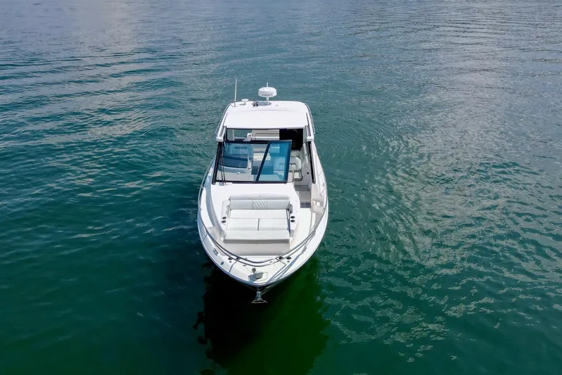  Yacht Photos Pics 2021 Regal 36 Grande Coupe on calm water, aerial view.