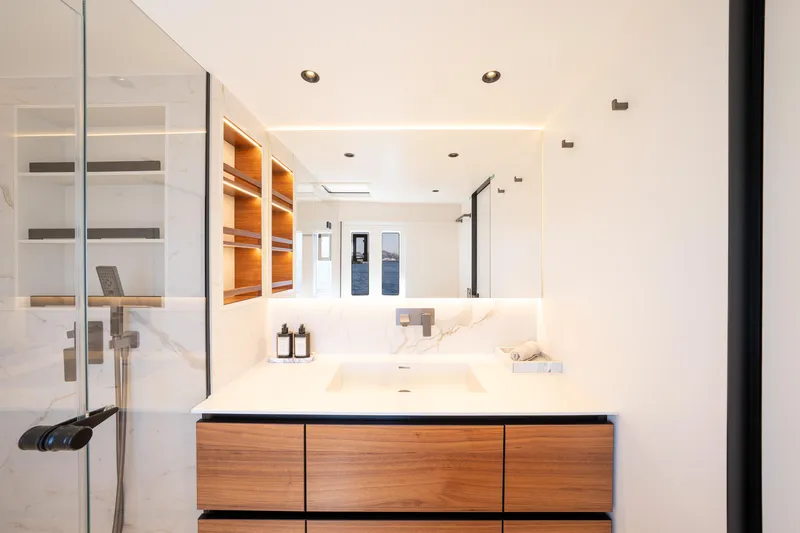  Yacht Photos Pics Luxurious bathroom interior on 2024 Sunreef 60 Eco yacht, featuring modern design and elegant fixtures.