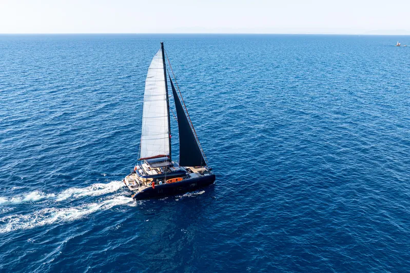  Yacht Photos Pics Sailing yacht Sunreef 60 Eco 2024 cruising on open blue sea.