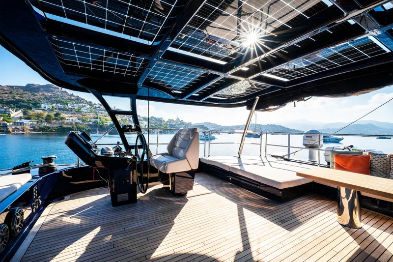  Yacht Photos Pics Luxurious 2024 Sunreef 60 Eco yacht interior with solar panels and scenic ocean view.