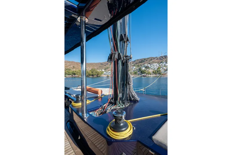  Yacht Photos Pics 2024 Sunreef 60 Eco yacht deck with ropes and scenic coastal view.