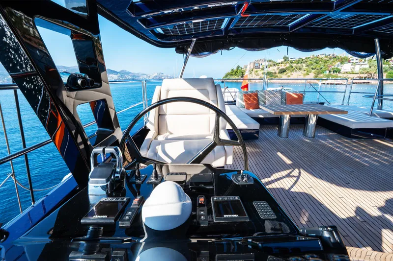  Yacht Photos Pics Luxurious Sunreef 60 Eco yacht interior, 2024 model, featuring modern helm and spacious deck.