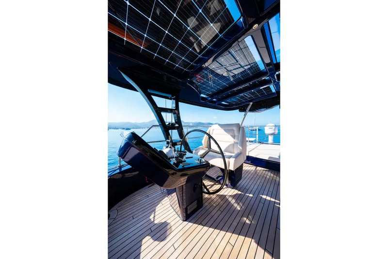  Yacht Photos Pics 2024 Sunreef 60 Eco yacht helm with solar panels and ocean view.