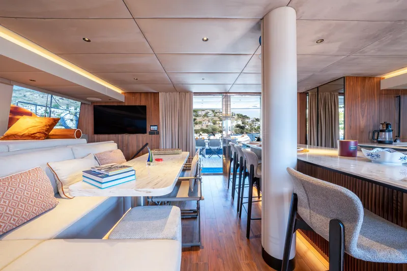  Yacht Photos Pics Luxurious interior of 2024 Sunreef 60 Eco yacht with modern furnishings and elegant design.