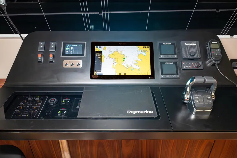  Yacht Photos Pics Control panel of 2024 Sunreef 60 Eco yacht with navigation and communication systems.