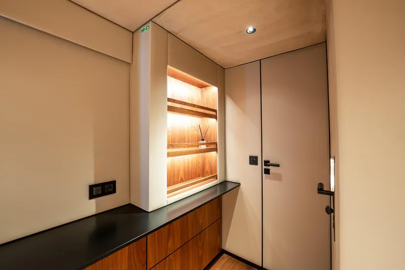  Yacht Photos Pics Luxurious interior of 2024 Sunreef 60 Eco yacht with elegant wood finishes and modern lighting.