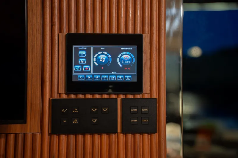  Yacht Photos Pics Control panel on 2024 Sunreef 60 Eco yacht, featuring touchscreen and switches.