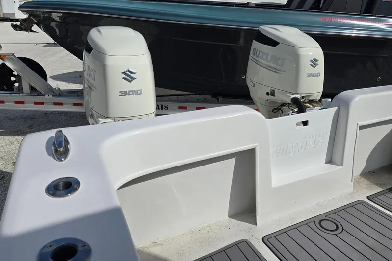  Yacht Photos Pics 2021 Twin Vee 310 CC GF boat with dual Suzuki 300 engines on trailer.