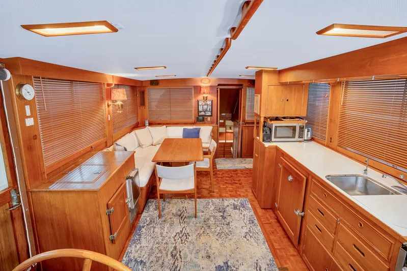 30 West Yacht Photos Pics Interior of 1991 Grand Banks 49 Classic yacht with wood finish and modern amenities.