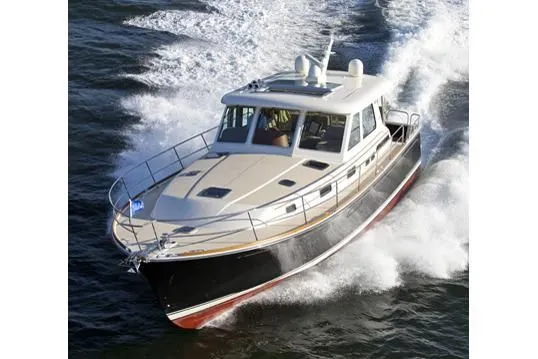 Vertical Yacht Photos Pics 2017 Sabre 48 Salon Express cruising on water.