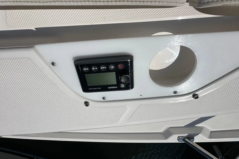  Yacht Photos Pics Control panel on 2019 Regal 42 Fly boat, featuring a Fusion MS-NRX300 stereo system.