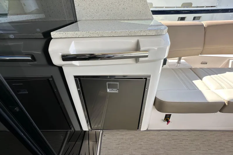  Yacht Photos Pics 2019 Regal 42 Fly yacht interior with seating and built-in storage.