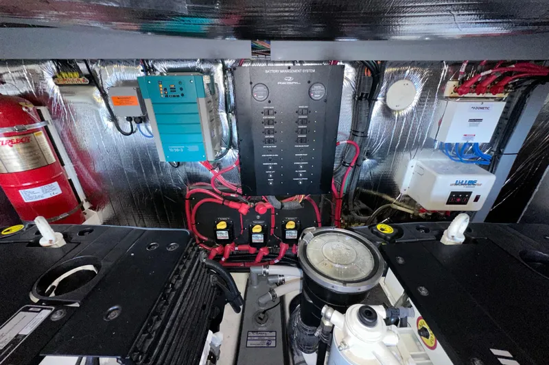  Yacht Photos Pics Engine room of 2019 Regal 42 Fly yacht with battery management system and fire extinguisher.