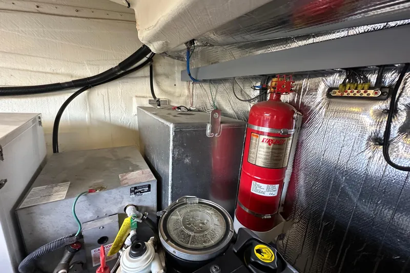  Yacht Photos Pics Engine room of 2019 Regal 42 Fly with fire extinguisher and equipment.