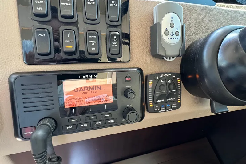  Yacht Photos Pics Control panel of a 2019 Regal 42 Fly with Garmin VHF 210 radio.