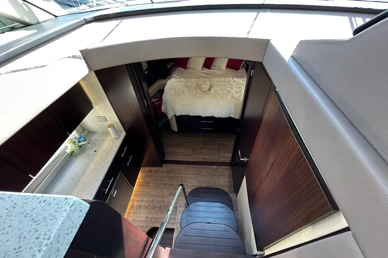  Yacht Photos Pics Luxurious interior of 2019 Regal 42 Fly yacht with modern design and cozy bedroom.
