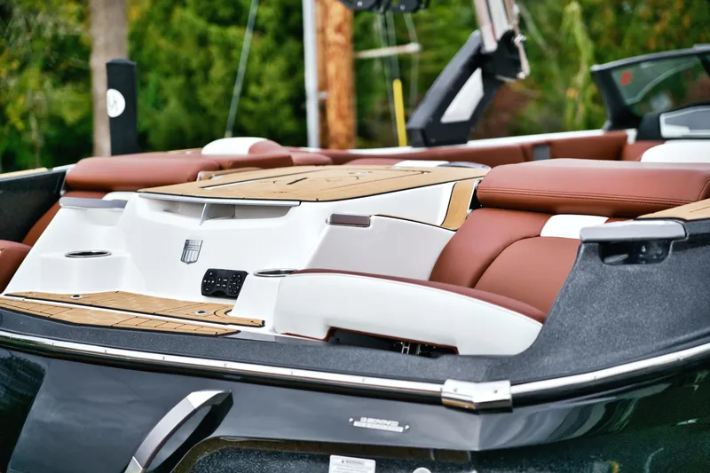  Yacht Photos Pics 2022 MasterCraft X24 boat interior with luxurious seating and sleek design.