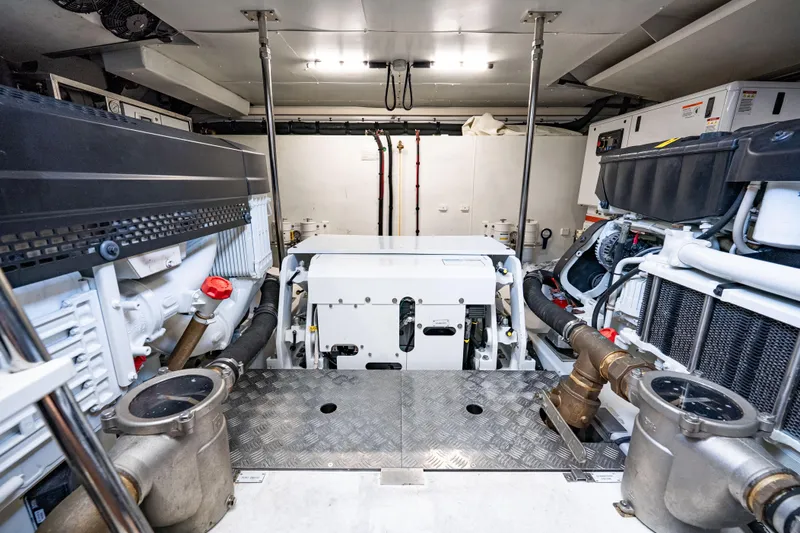 Next Play Yacht Photos Pics Engine room of 2024 Azimut Fly 68 yacht, showcasing advanced machinery and equipment.