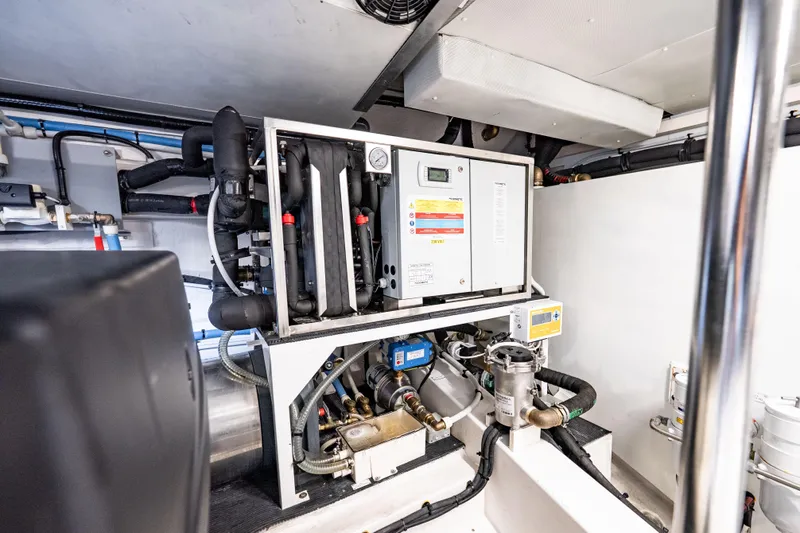 Next Play Yacht Photos Pics Engine room of 2024 Azimut Fly 68 yacht, showcasing advanced machinery and systems.