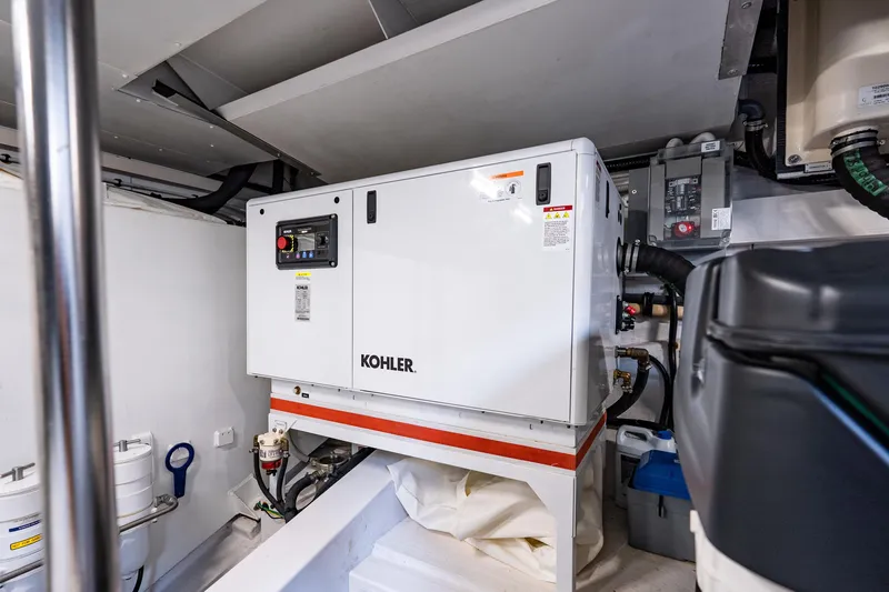 Next Play Yacht Photos Pics Engine room of 2024 Azimut Fly 68 yacht featuring a Kohler generator.