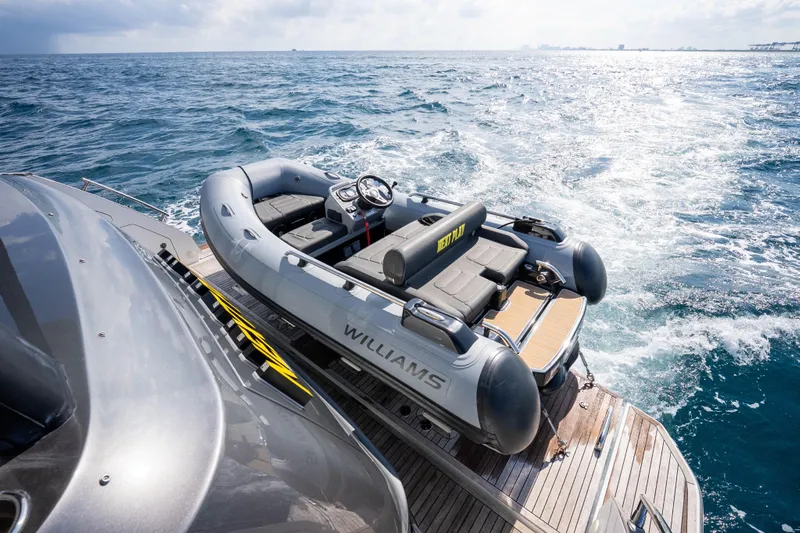 Next Play Yacht Photos Pics Azimut Fly 68 yacht with Williams tender on ocean, 2024 model.
