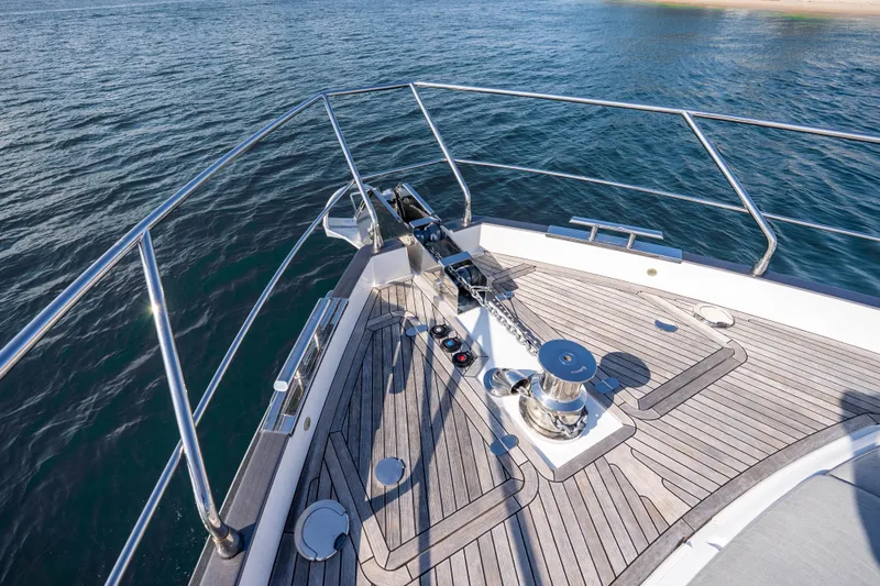 Next Play Yacht Photos Pics Bow of 2024 Azimut Fly 68 yacht with teak decking and anchor system.