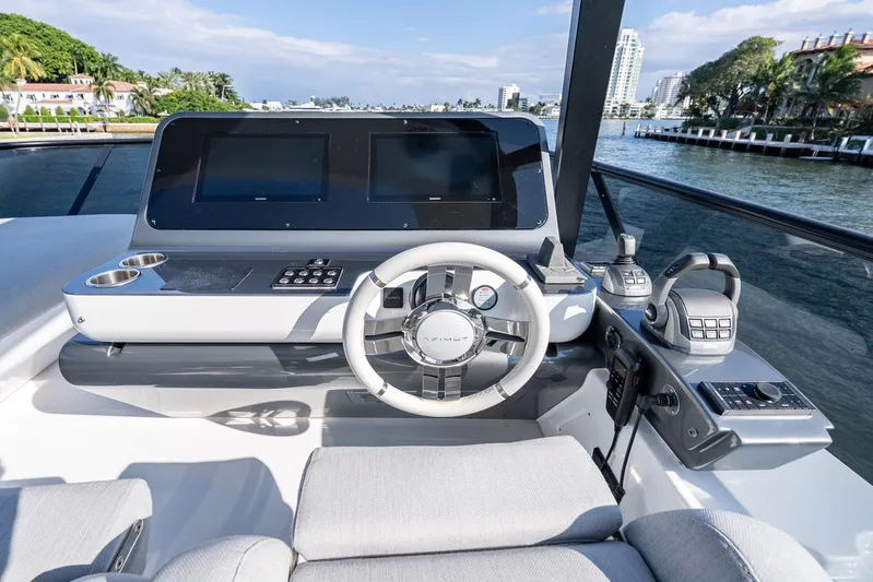 Next Play Yacht Photos Pics 2024 Azimut Fly 68 yacht helm with modern controls and dual screens.