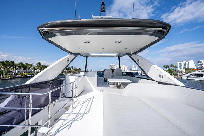Next Play Yacht Photos Pics 2024 Azimut Fly 68 yacht deck with modern seating and ocean view.