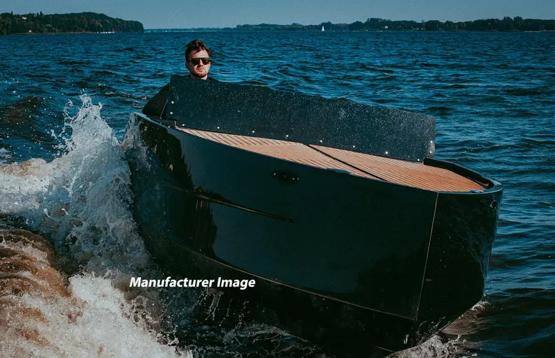  Yacht Photos Pics 2024 D-Boat 22 Diamond Series cruising on open water, showcasing sleek design.