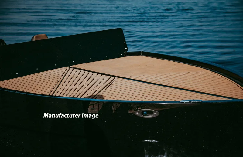  Yacht Photos Pics 2024 D-Boat 22 Diamond Series with sleek wooden deck on calm water.