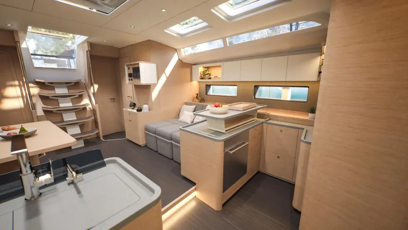  Yacht Photos Pics Luxurious interior of 2025 Dufour 54 yacht with modern kitchen and seating area.