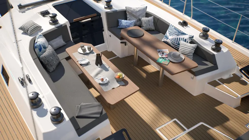  Yacht Photos Pics Luxurious 2025 Dufour 54 yacht deck with elegant seating and dining area.