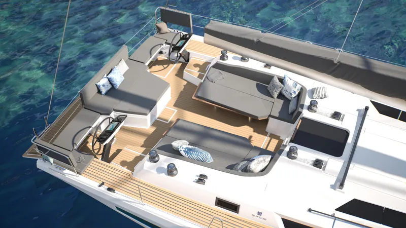  Yacht Photos Pics Luxurious 2025 Dufour 54 yacht deck with elegant seating and steering wheels on clear blue water.