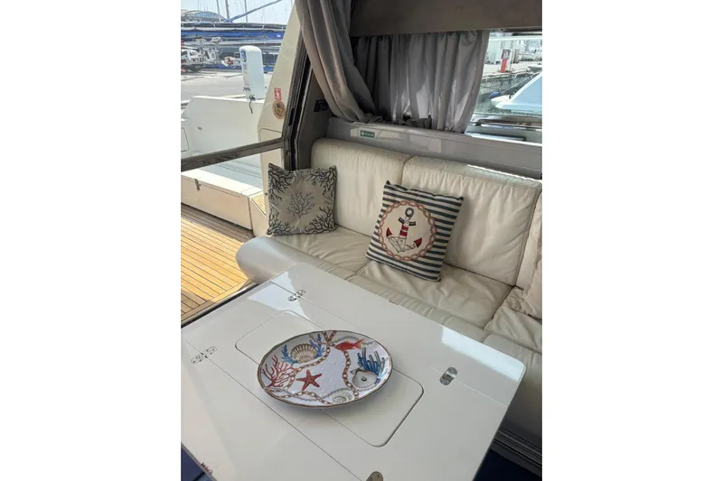  Yacht Photos Pics Luxurious interior of 1992 Mochi Craft 46 yacht with nautical-themed decor.