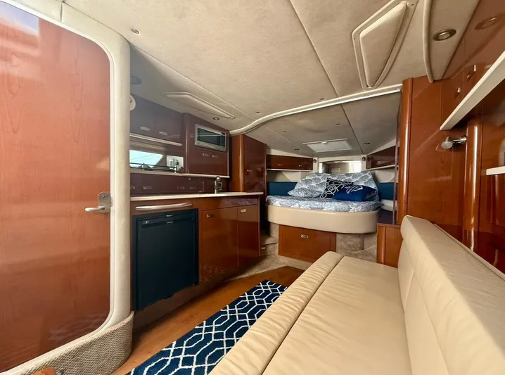  Yacht Photos Pics Interior of 2011 Sea Ray 350 Sundancer yacht with cozy cabin and modern amenities.