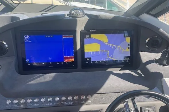  Yacht Photos Pics Dashboard of 2020 Riviera 6000 Sport Yacht Platinum Edition with navigation screens.