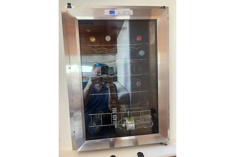  Yacht Photos Pics Wine cooler on 2020 Riviera 6000 Sport Yacht Platinum Edition, stainless steel finish.