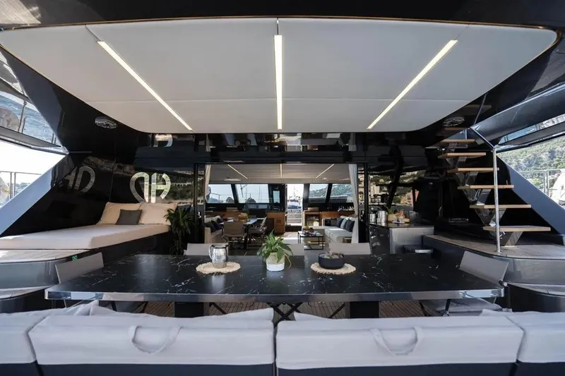  Yacht Photos Pics Luxurious interior of 2024 Sunreef 60 Power Eco yacht with modern design and elegant furnishings.