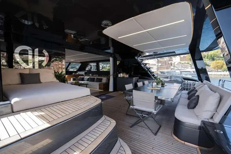  Yacht Photos Pics Luxurious Sunreef 60 Power Eco yacht interior, featuring elegant seating and dining area, 2024 model.