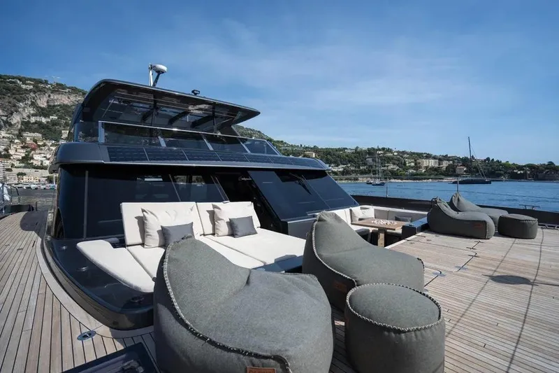  Yacht Photos Pics Luxurious 2024 Sunreef 60 Power Eco yacht with spacious deck and comfortable seating.